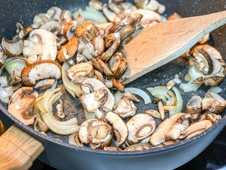 Sauté sliced mushrooms