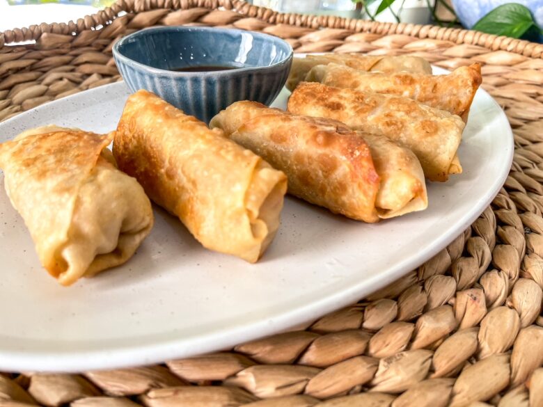 Pan fried eggrolls served with red sweet and sour sauce. 