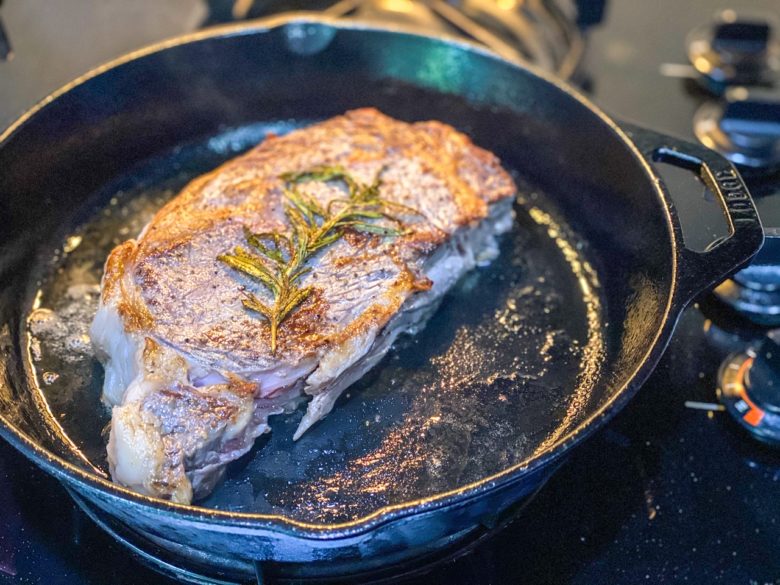 Sear a sous vide steak in oil in a cast iron pan. 